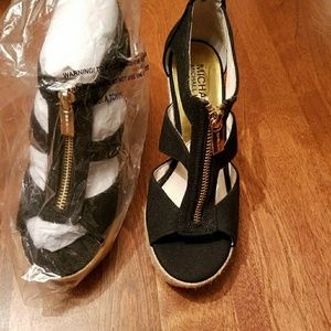 Brand new, never-worn black wedges